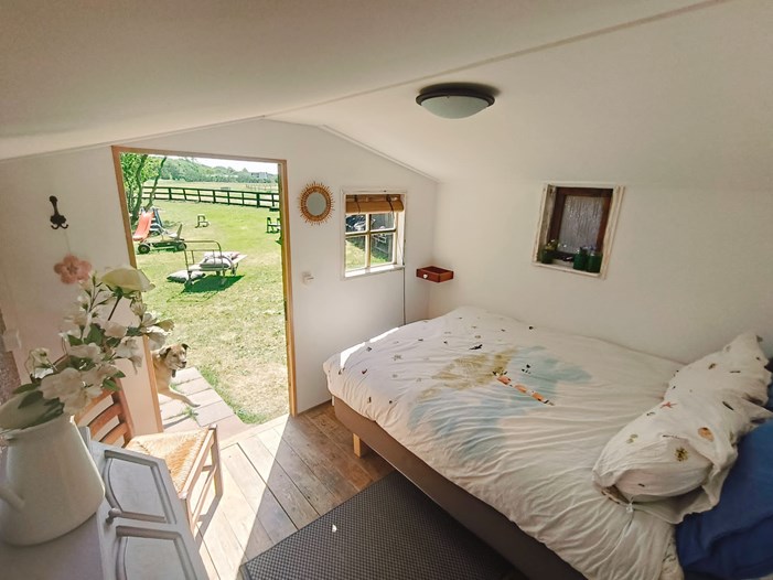 Tuinhuis met uitzicht op de wei